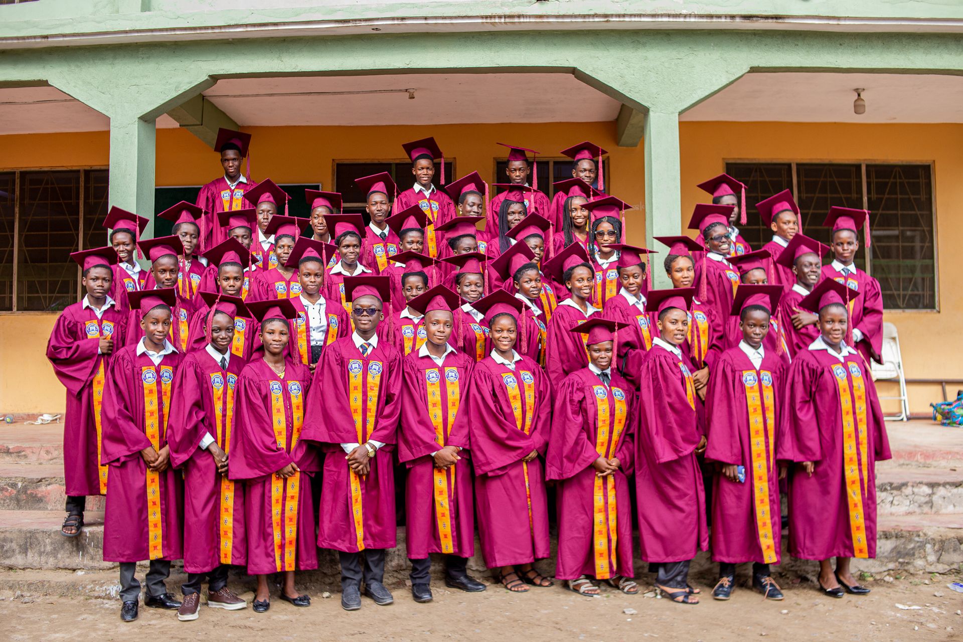 Graduates celebrating an educational milestone in Winneba, Ghana