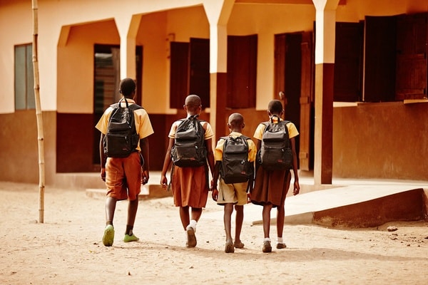 A student walking to school in Ghana, reflecting SEF’s educational purpose